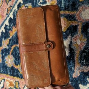 The Sak phone wallet floral engraved